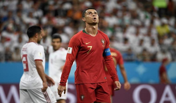 Cristiano Ronaldo tuvo el 2-0 de penal, pero falló y al final fue 1-1. (AFP)