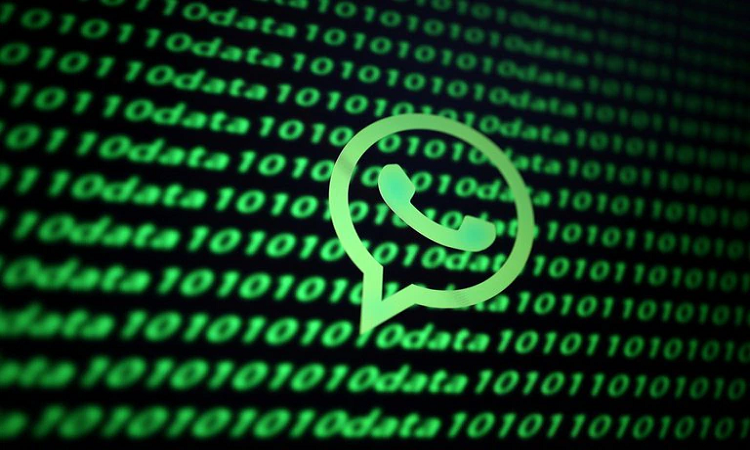 FILE PHOTO: The Whatsapp logo and binary cyber codes are seen in this illustration taken November 26, 2019. REUTERS/Dado Ruvic/Illustration/File Photo